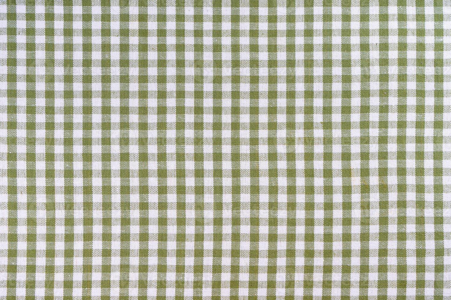 Green classic checkered tablecloth texture, background with copy space. photo