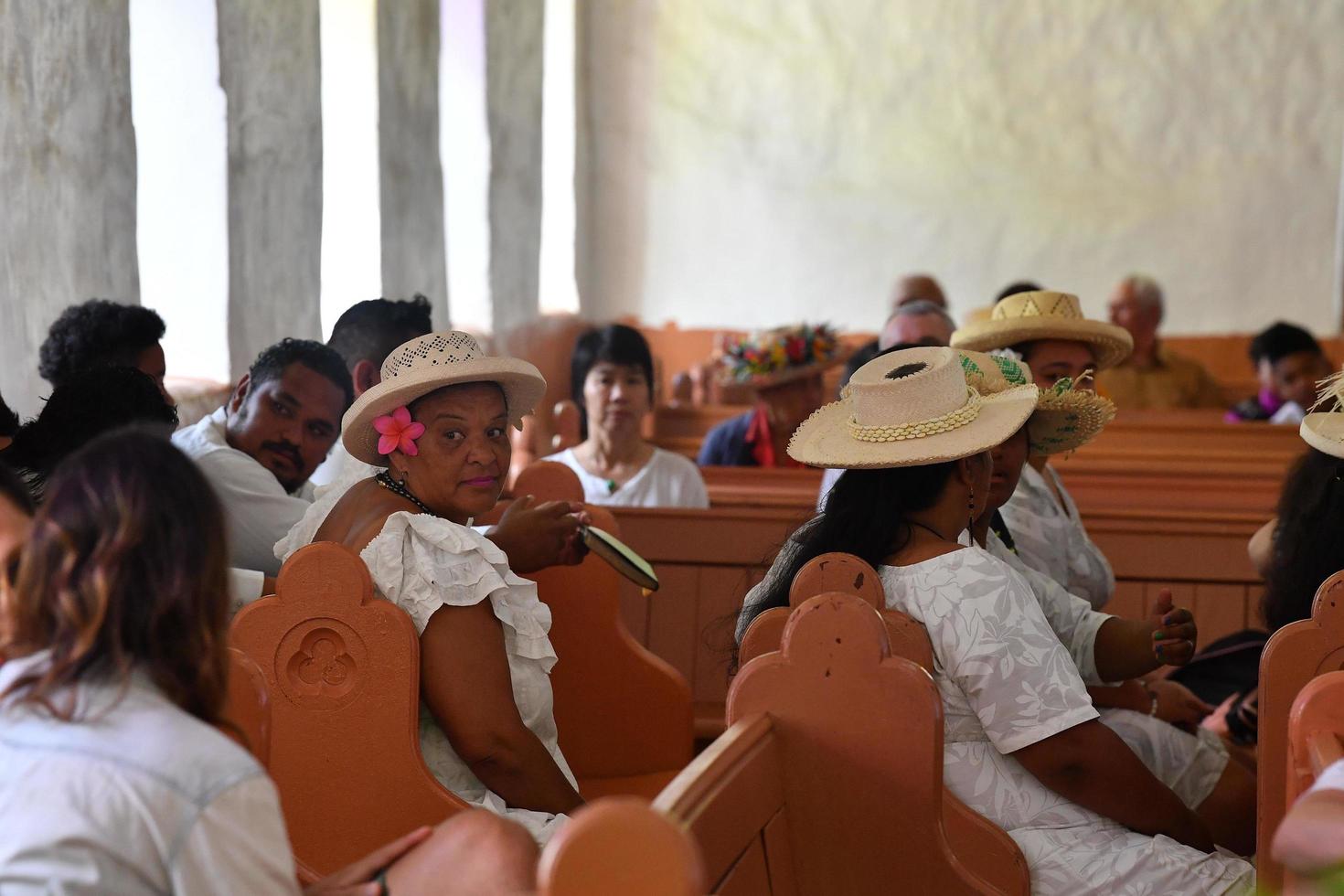 AITUTAKI, COOK ISLAND - AUGUST, 27 2017 - Local people at the mass photo