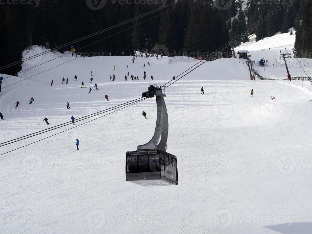 cable way in dolomites gardena valley snow mountains photo