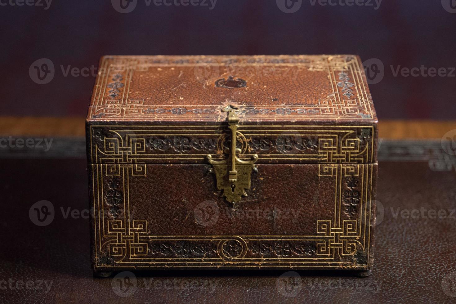 old ancient secret casket on a desk photo