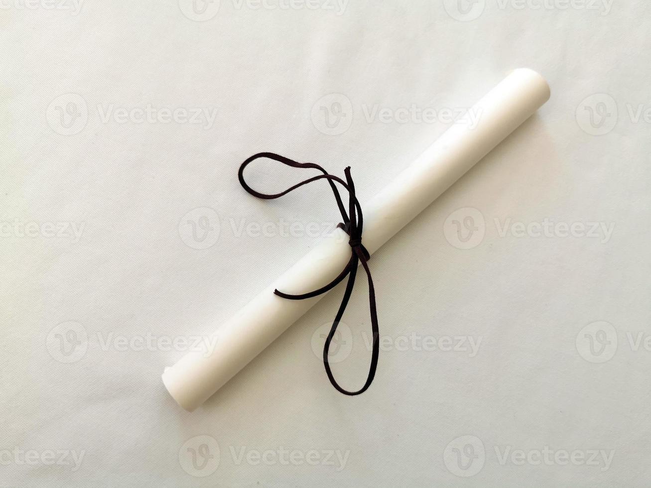 Parchment scroll vellum on a table photo