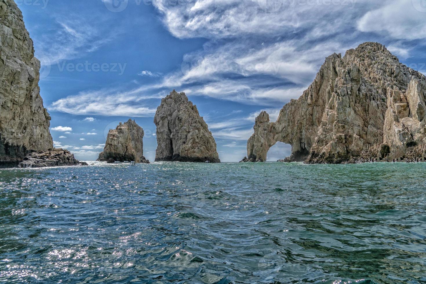 waves on arch rocks in cabo san lucas mexico photo