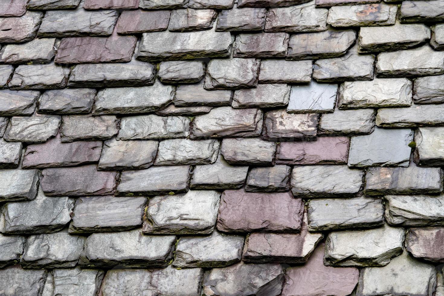 old stone shingles roof detail photo