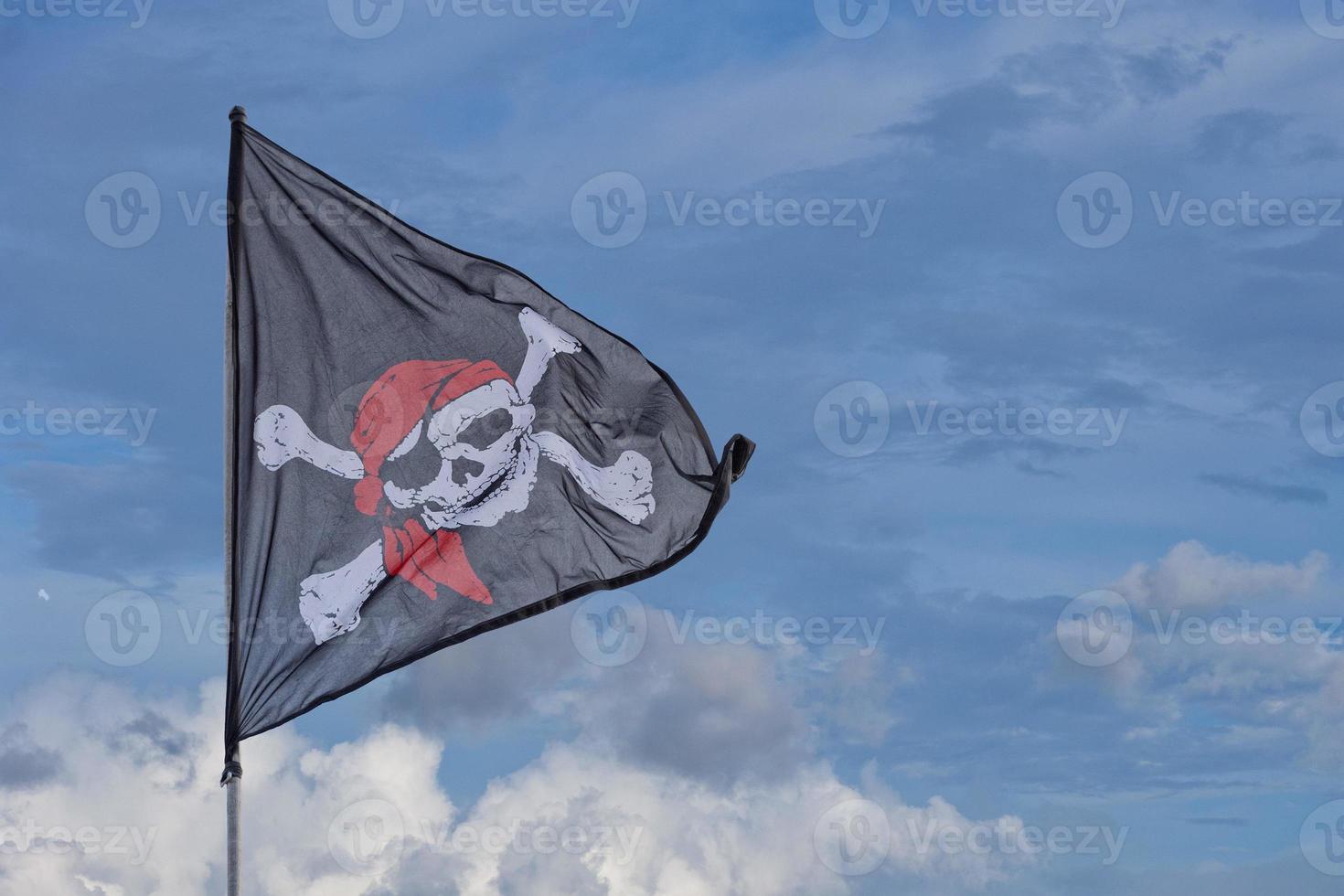 waving pirate flag jolly roger photo