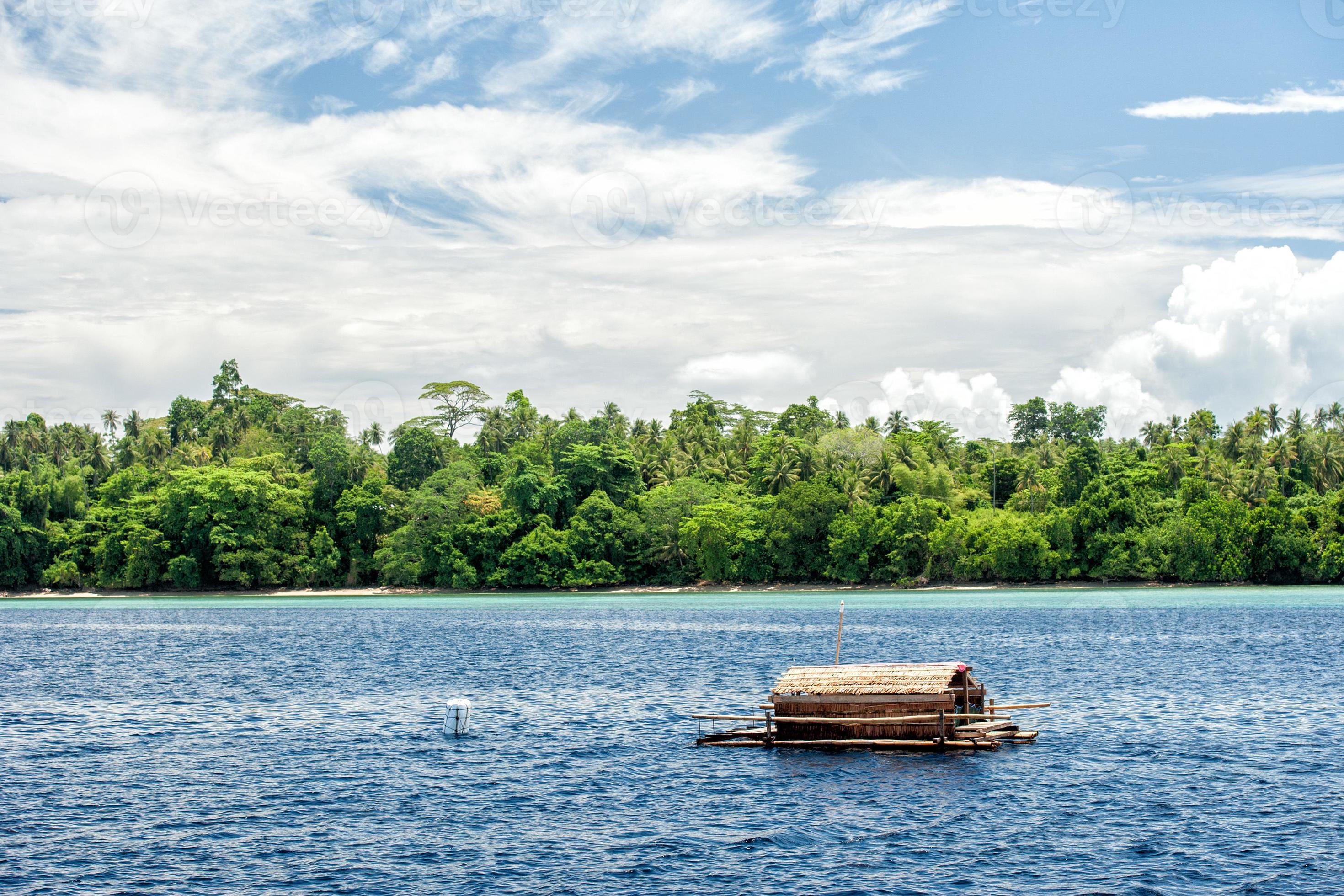 Small wood floating fishing platform in sulawesi indonesia