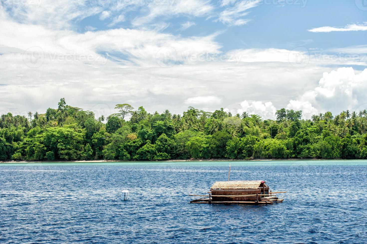 Small wood floating fishing platform in sulawesi indonesia photo