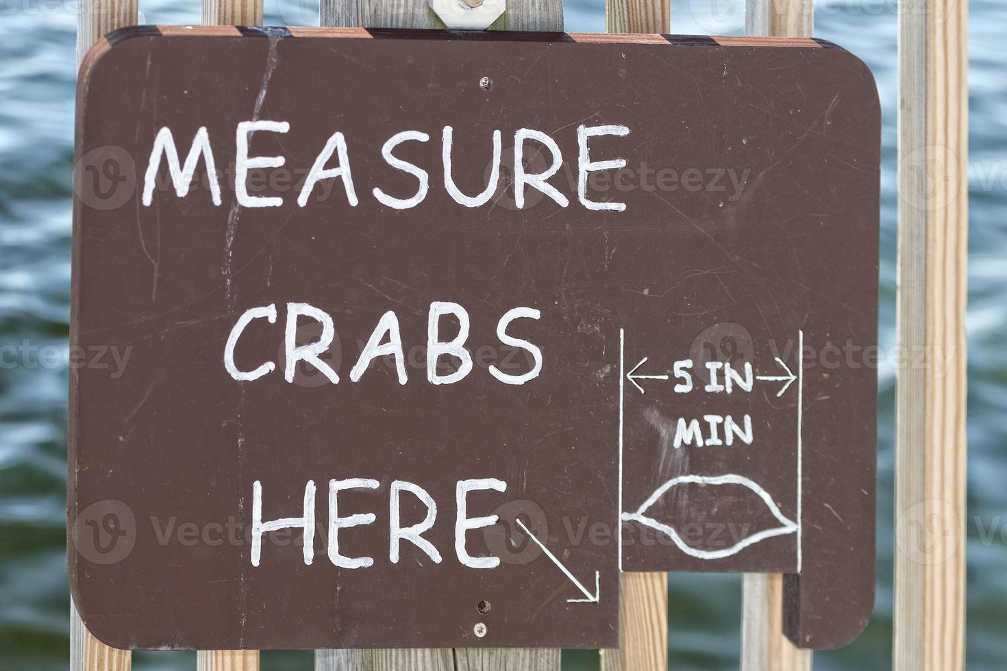 Measure crabs here sign photo