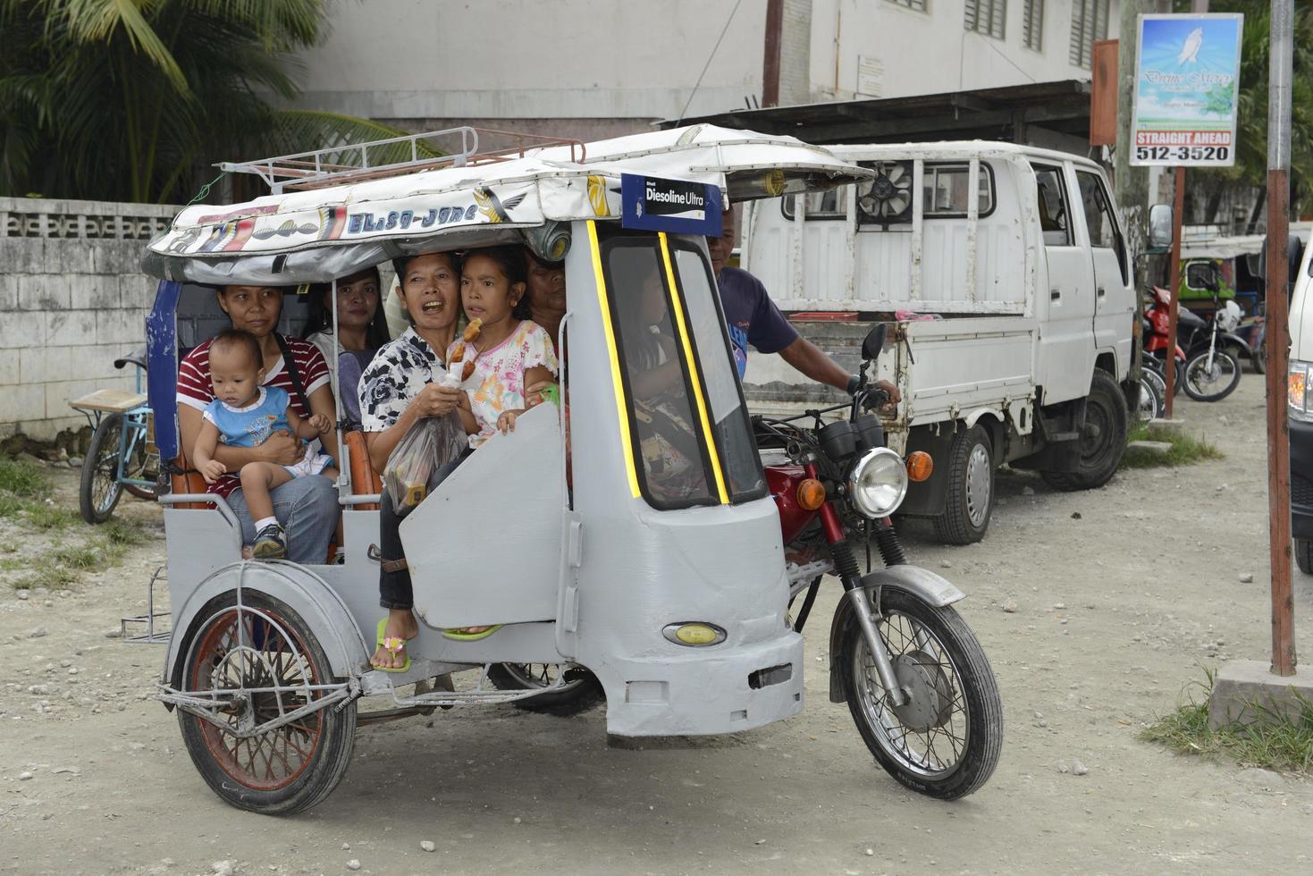 CEBU - PHILIPPINES - JANUARY,7 2013 - People goinjg to the local market photo