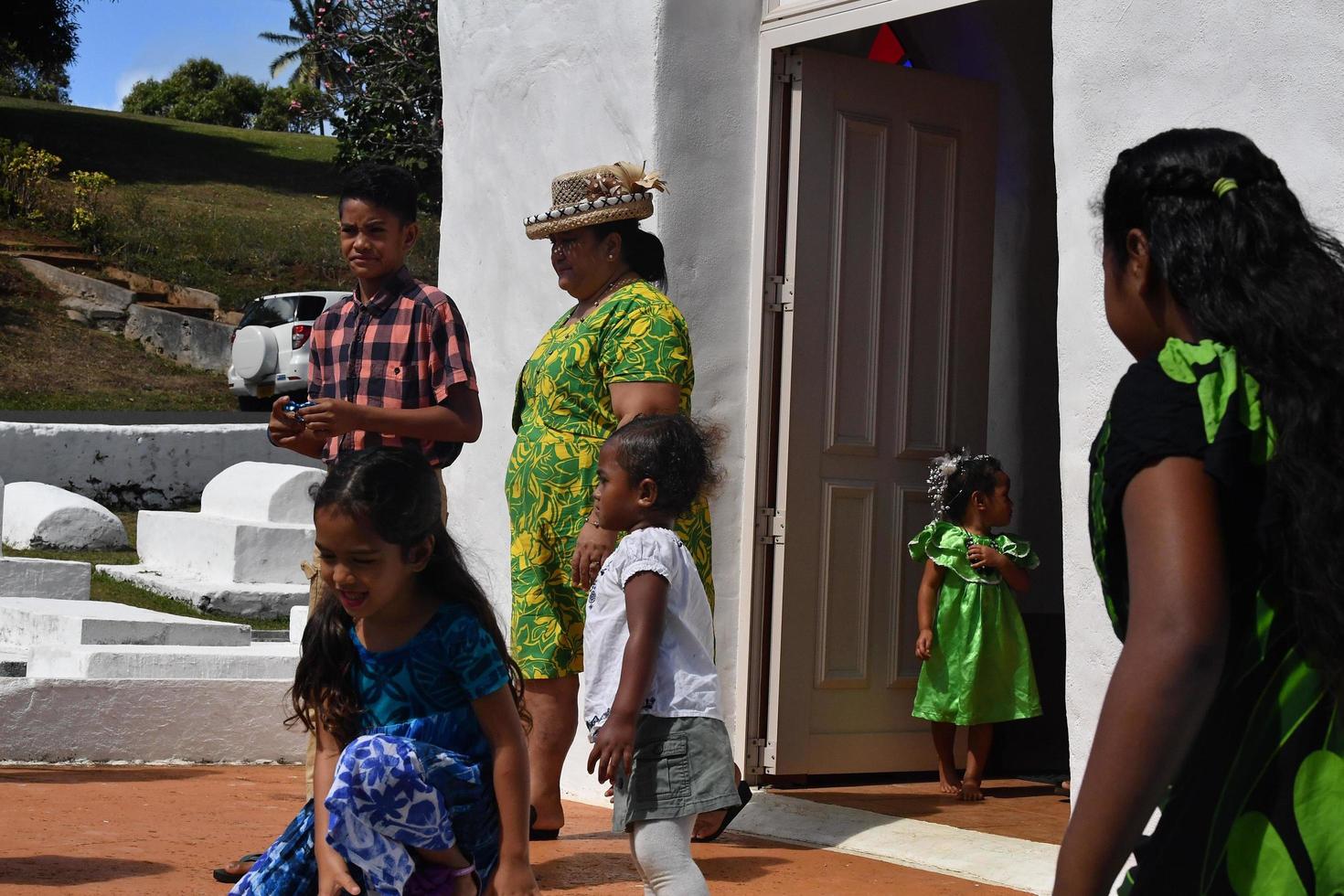 AITUTAKI, COOK ISLAND - AUGUST, 27 2017 - Local people at the mass photo