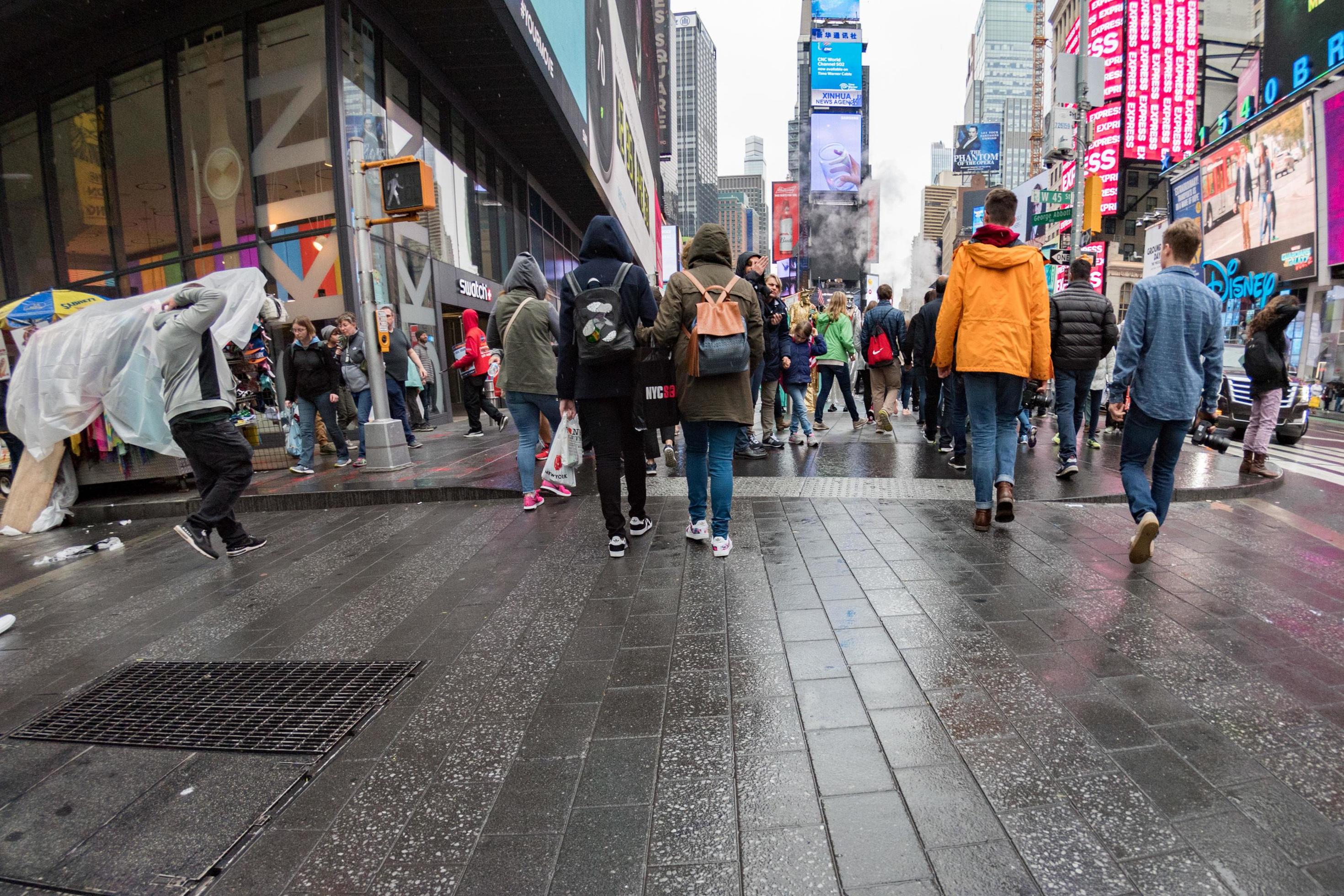 NEW YORK USA APRIL 22 2017 times square moving people in rainy day
