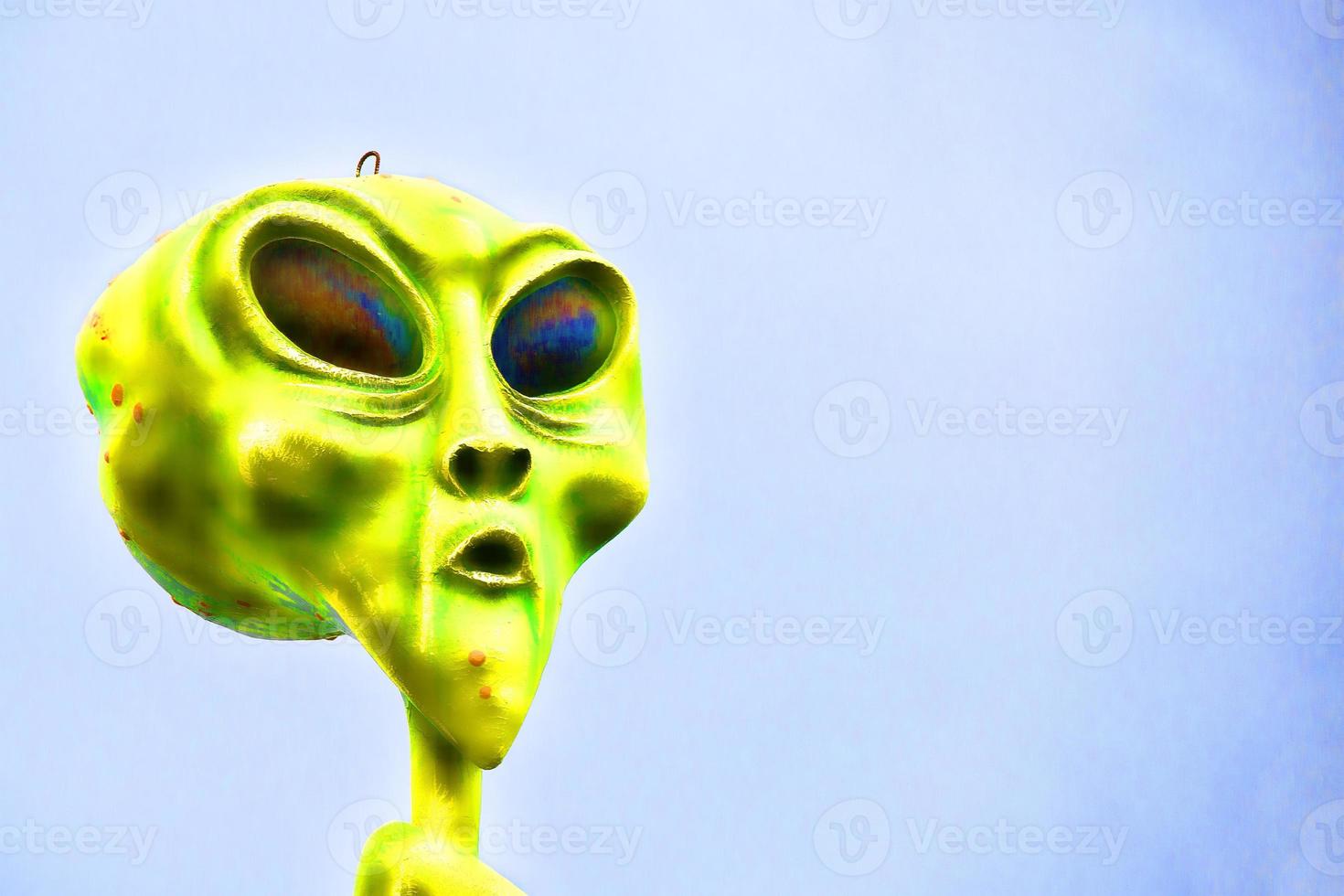cabeza alienígena verde foto
