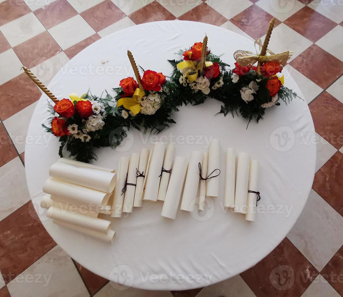 Parchment scroll vellum on a table photo