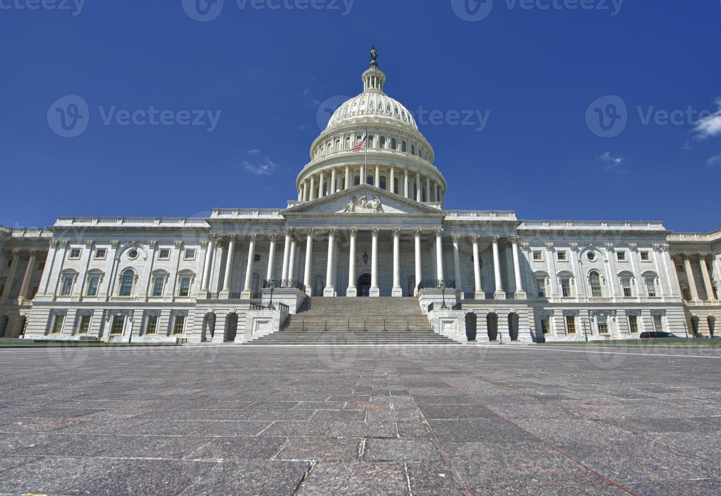 Washington US Capitol on brighty sky background photo