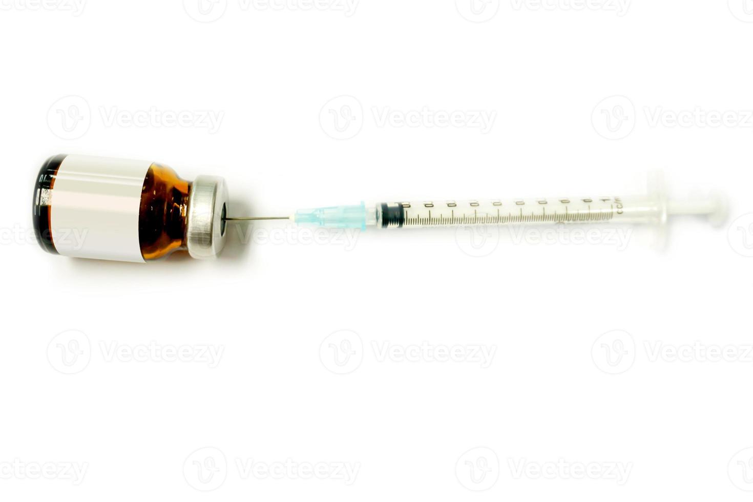 Top view of Vaccine in vial of drug is opened are prepared for injection to patient isolate on white background. photo