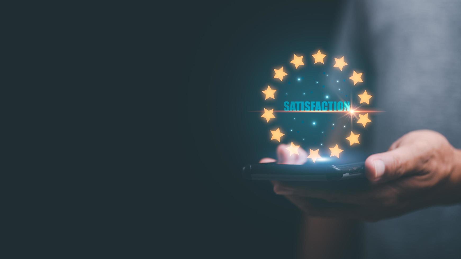 Male consumers show satisfaction ratings through online channels, customer service concept. The best business rating experience, positive ratings, quality guaranteed products and services. photo