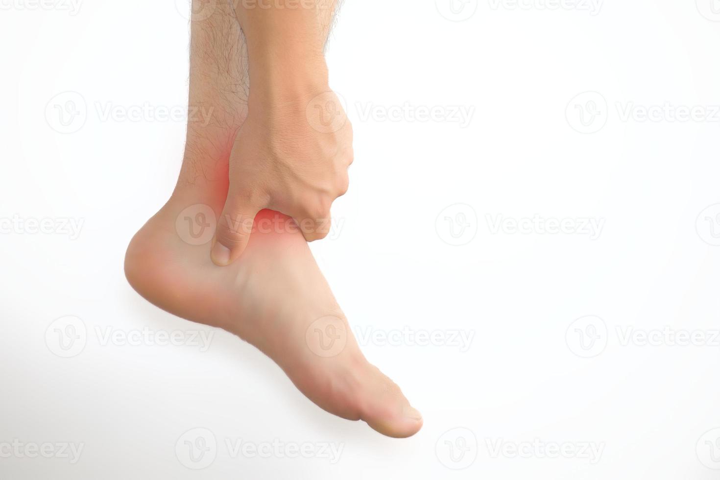 Man with foot pain and copyspace photo