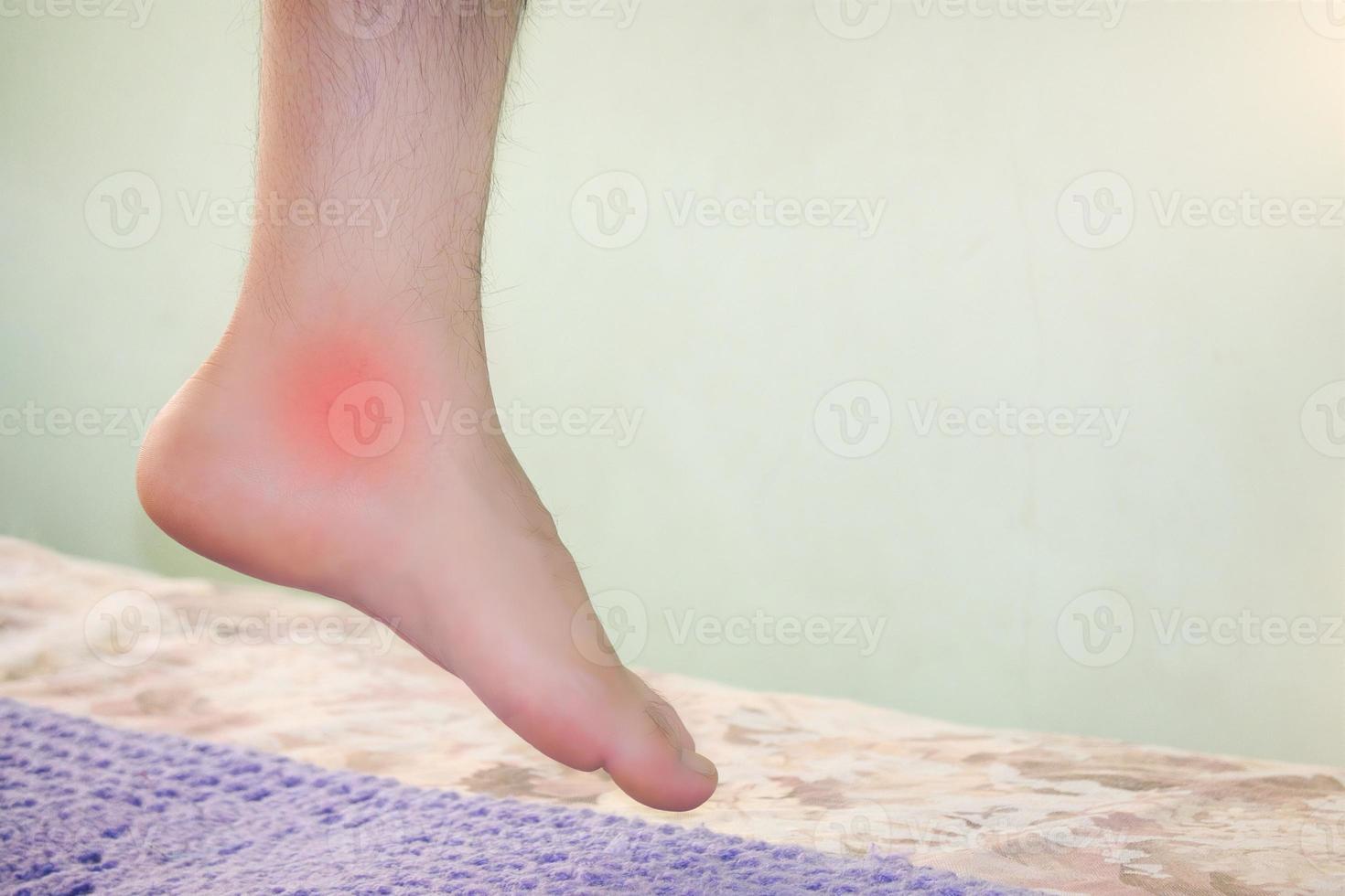 Man with foot pain and copyspace photo