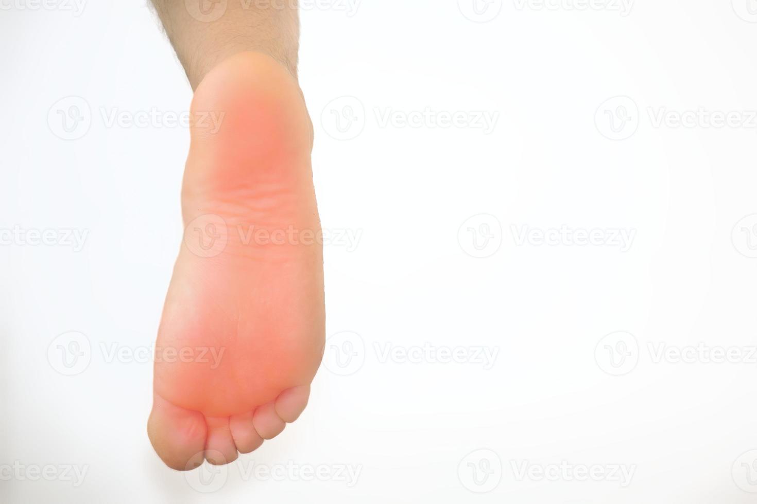 Man with foot pain and copyspace photo