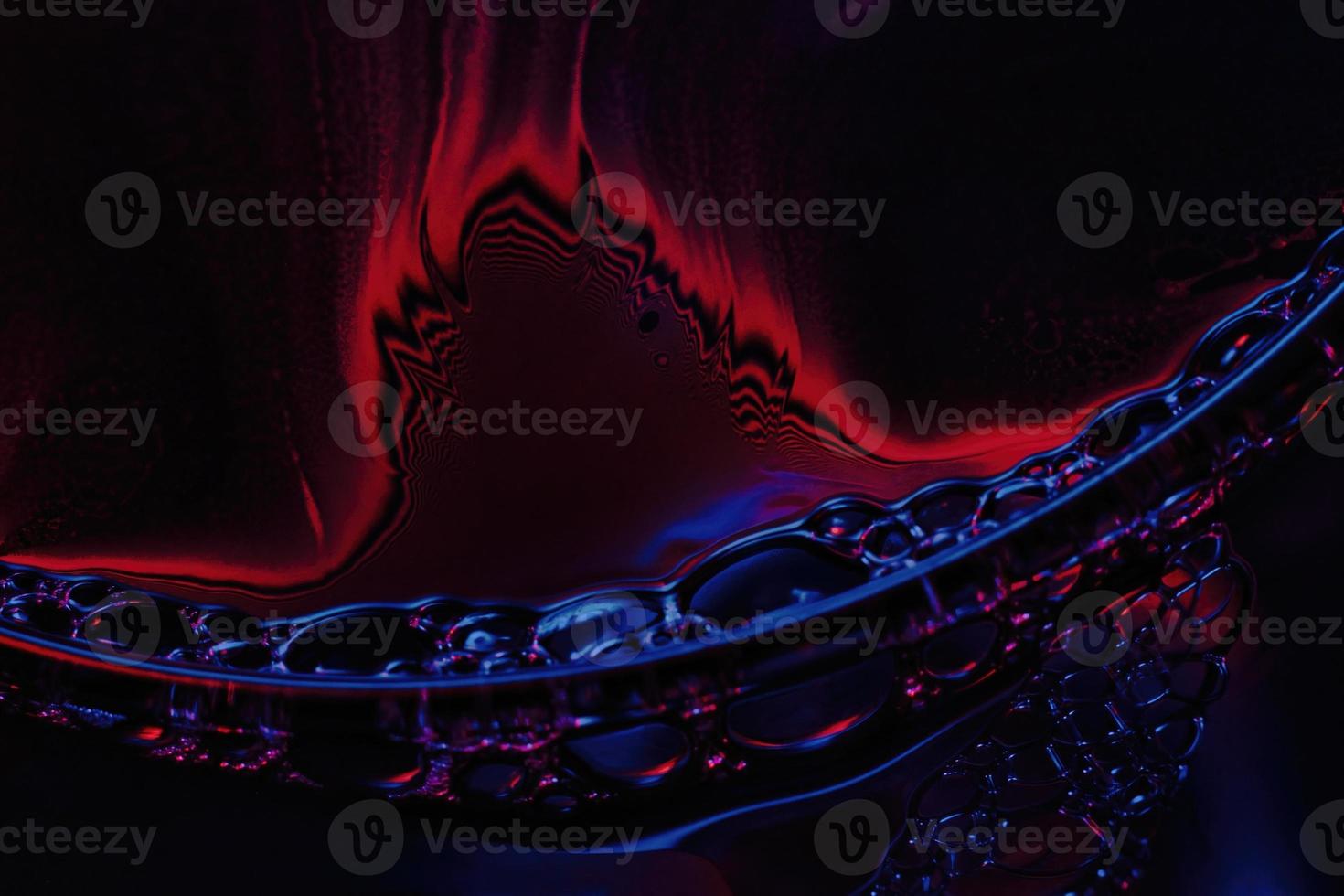 Beautiful psychedelic abstraction formed by light on the surface of a soap bubble photo