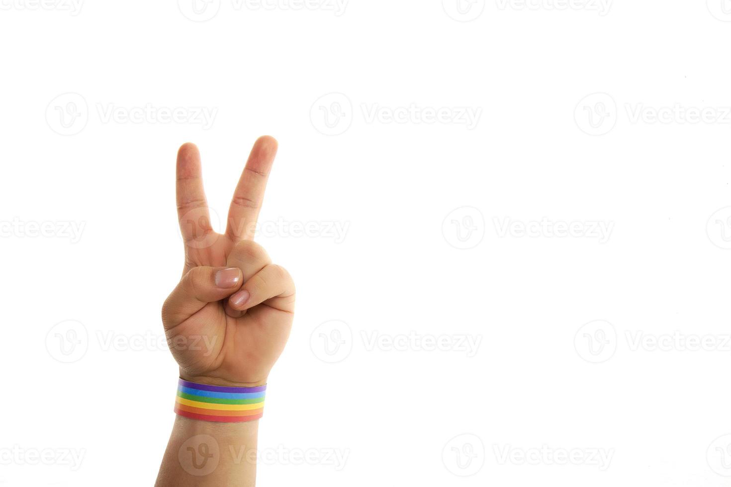 Hand with bracelet with gay lgbt colors photo