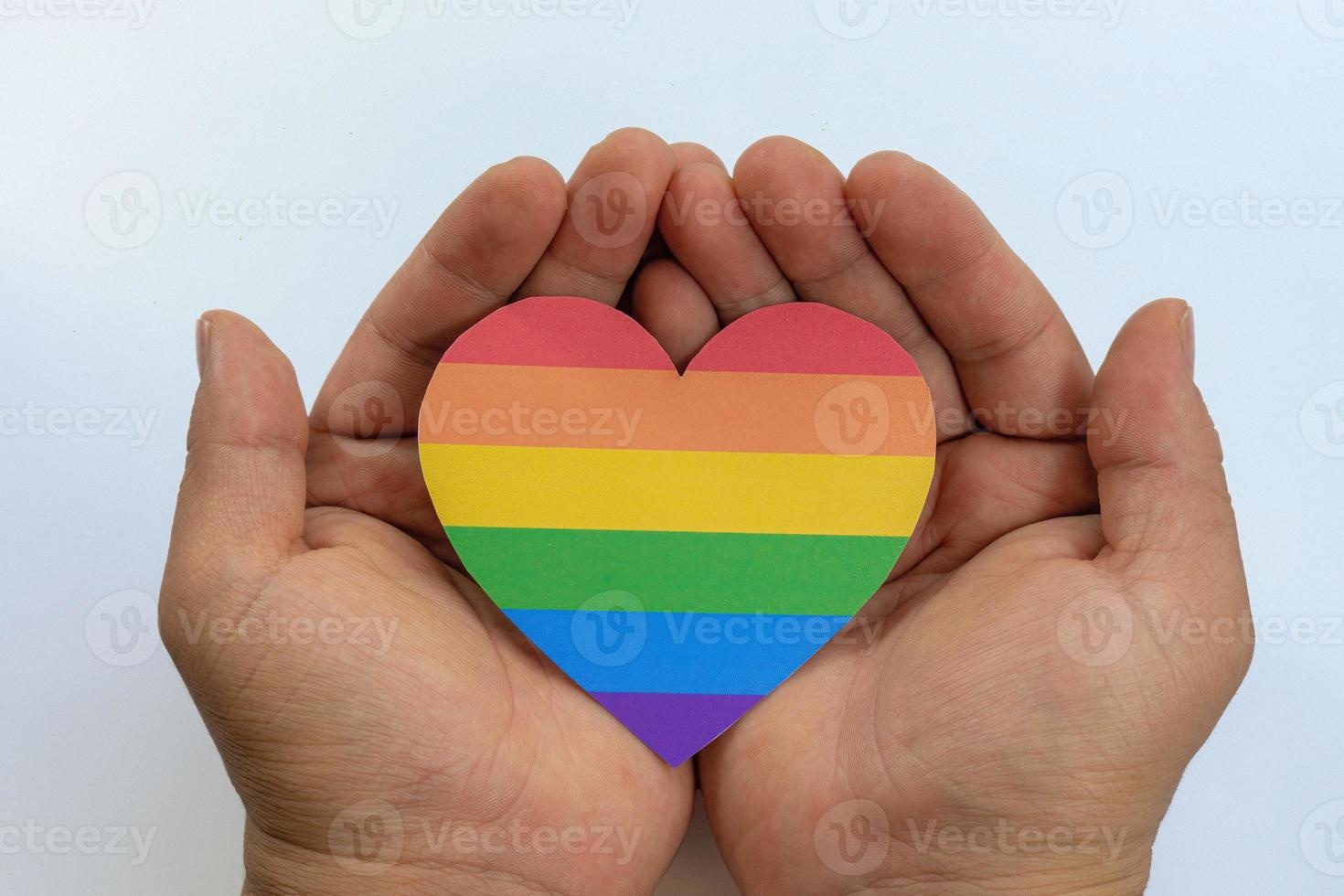 Hands with heart in gay lgbt colors photo