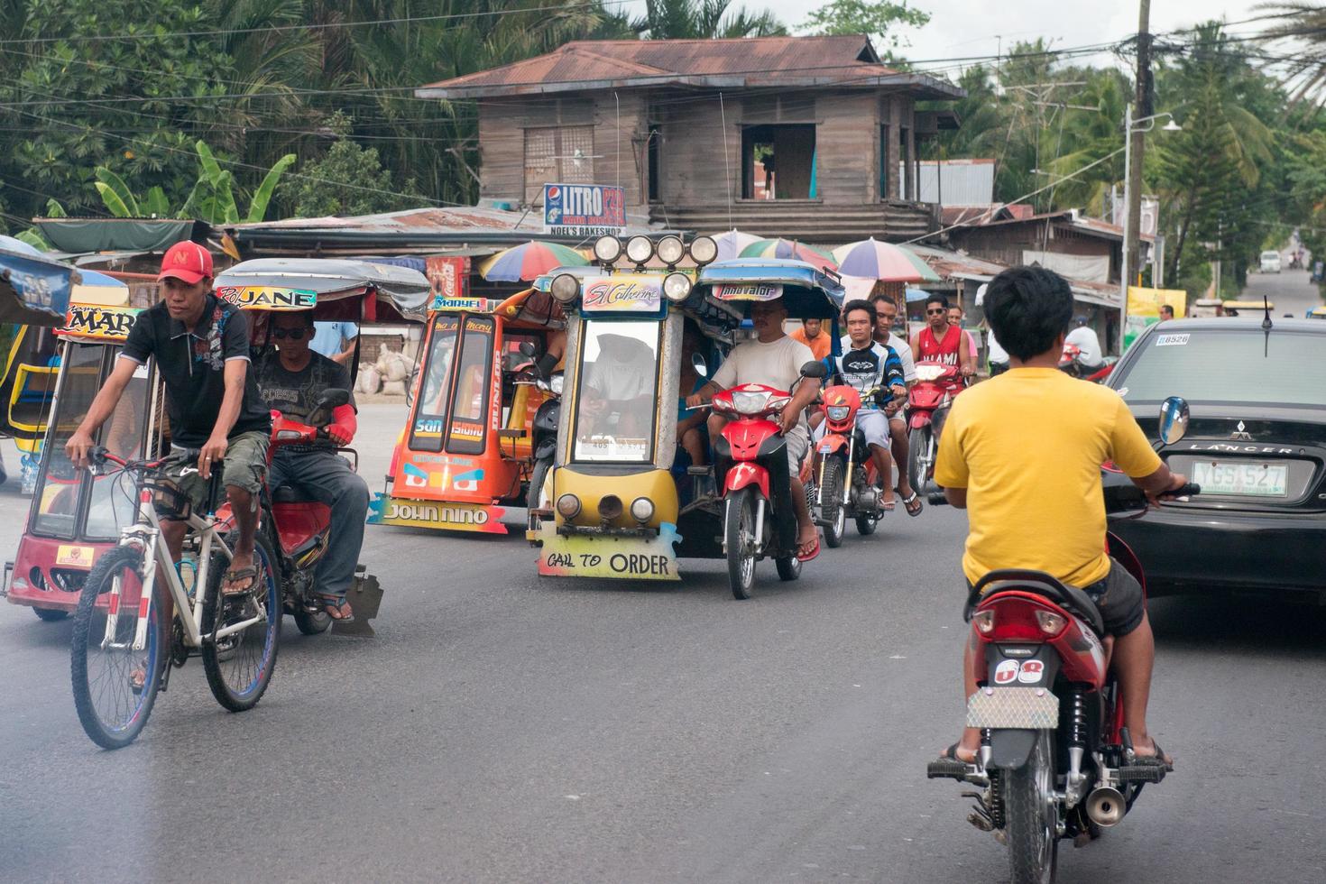 CEBU - PHILIPPINES - JANUARY,7 2013 - Town street congested traffic photo