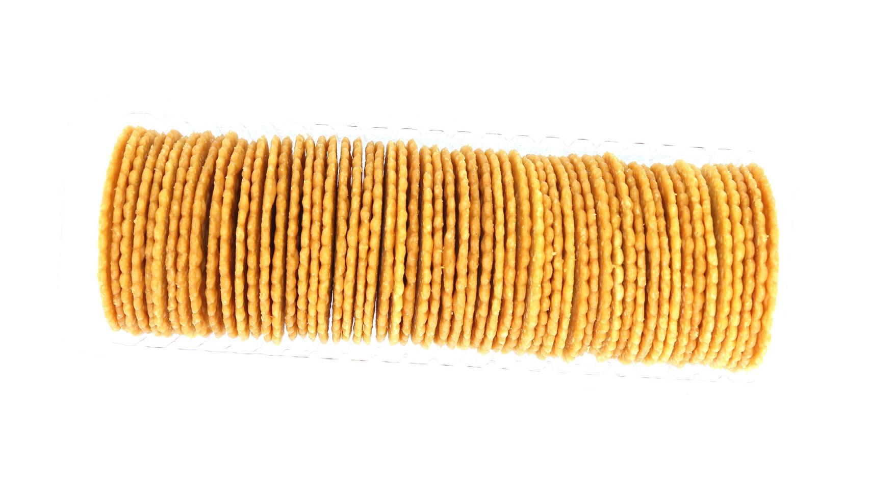 a row of round cracker isolated on white background photo