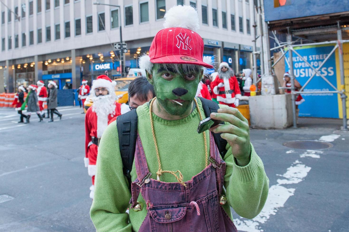 NEW YORK, USA - DECEMBER 10, 2011 - People deressed as santa claus celebrating xmas photo