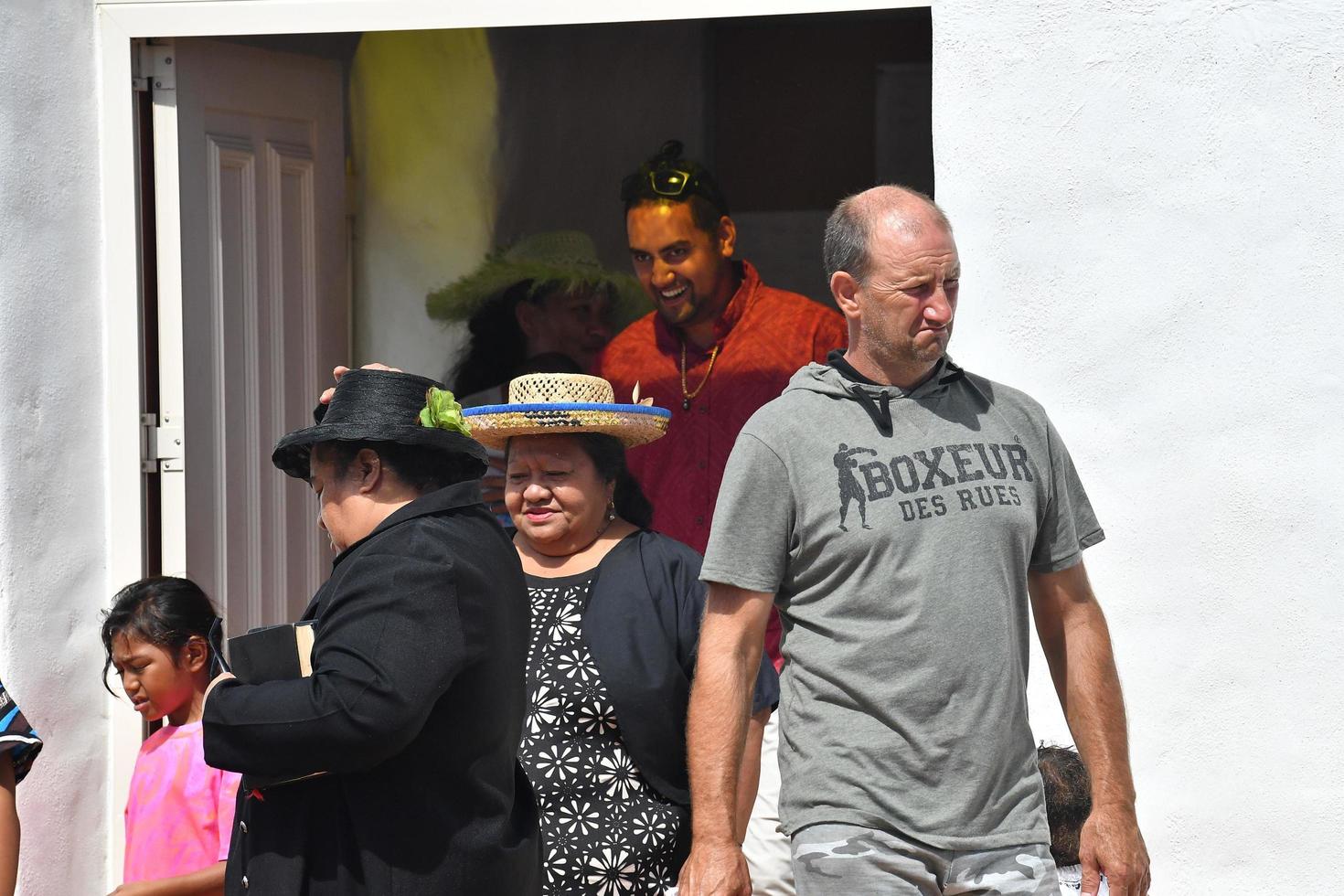 AITUTAKI, COOK ISLAND - AUGUST, 27 2017 - Local people at the mass photo