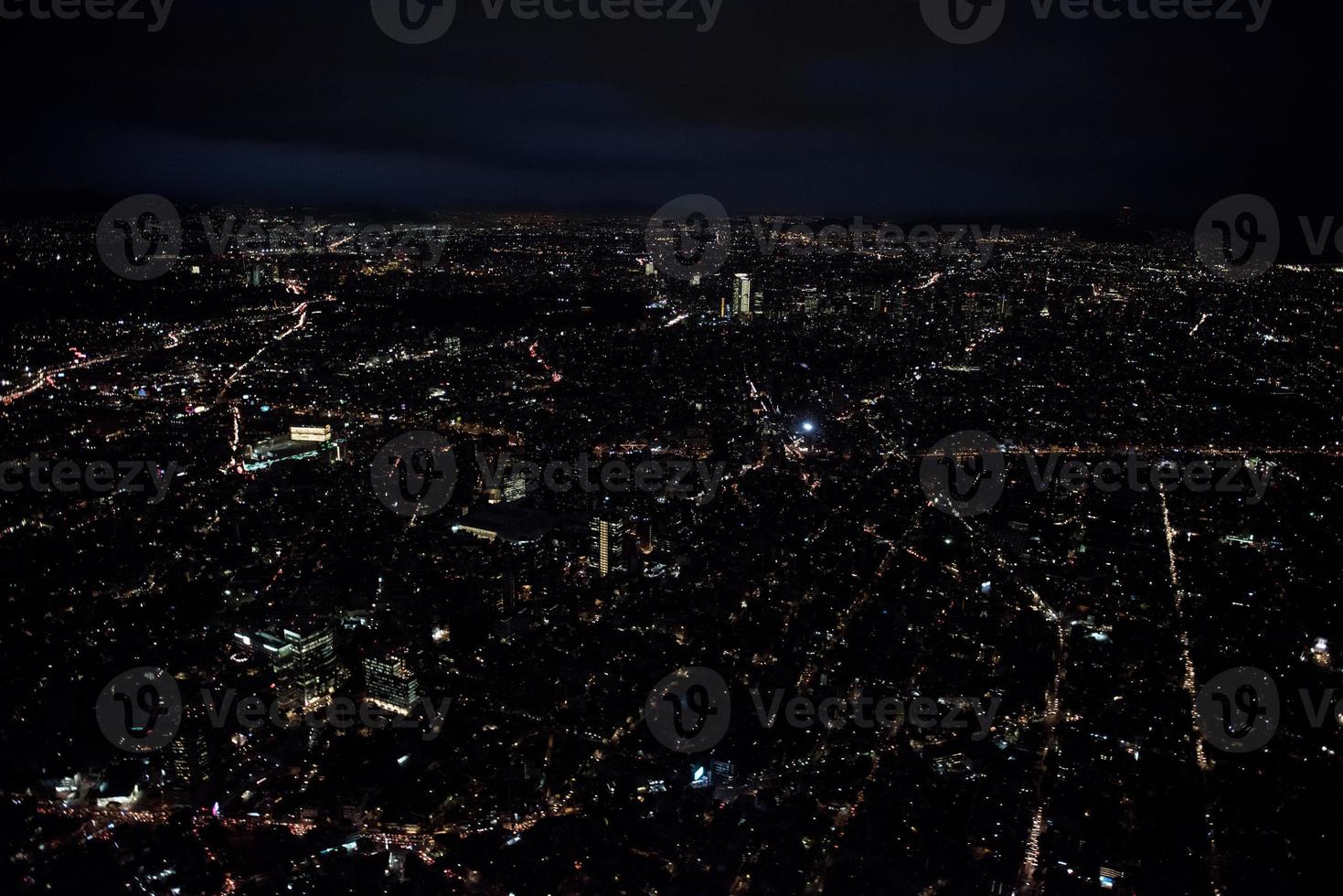 mexico city aerial night view panorama of heavy traffic photo