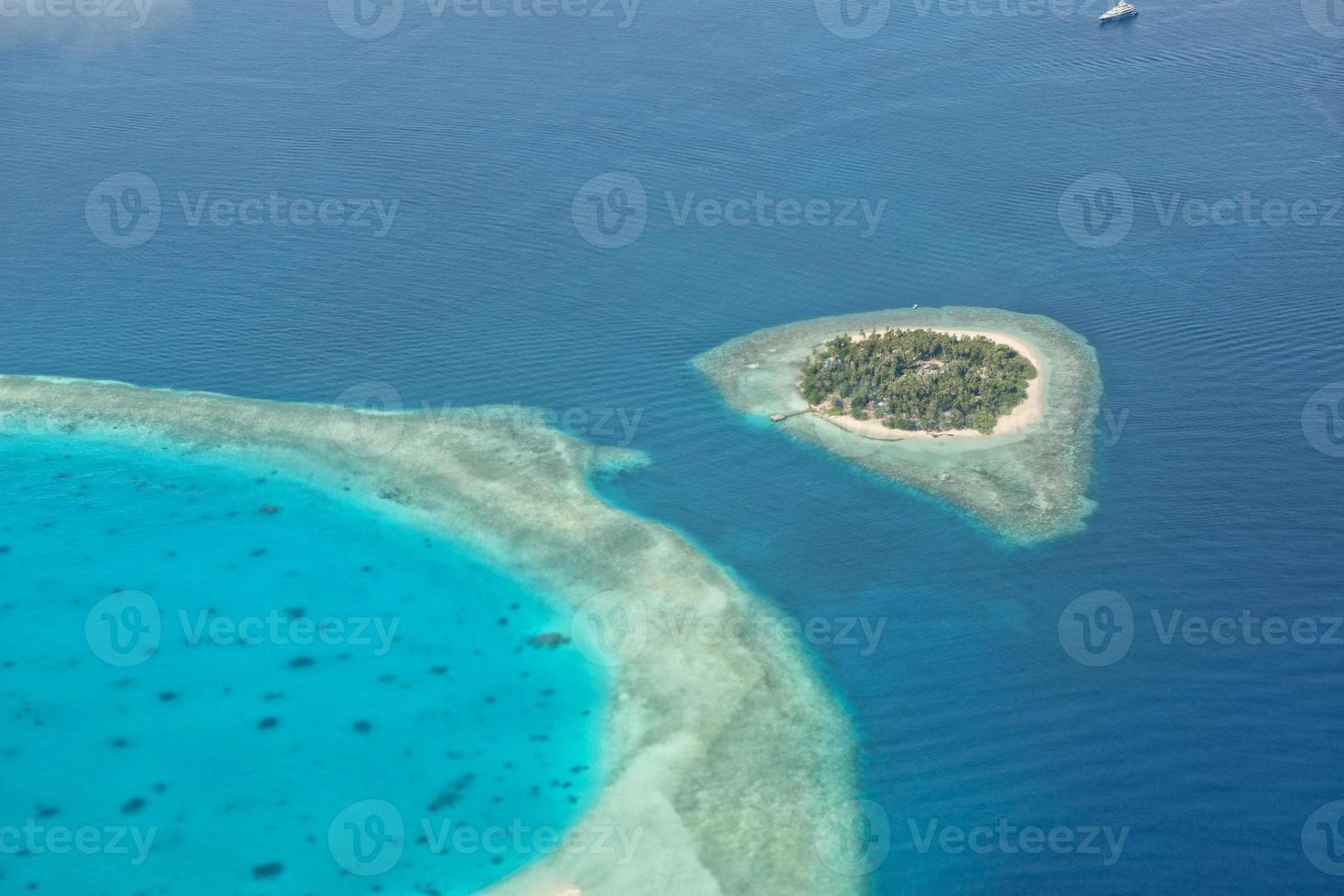 maldives aerial panorama blue water reef photo