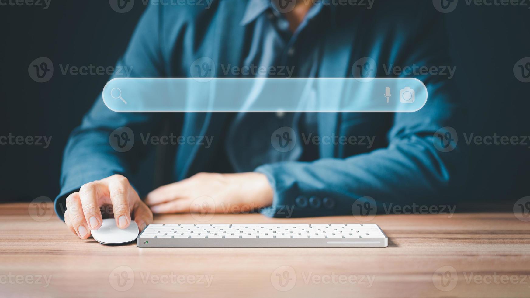 Businessman's hands are using a computer keyboard to searching for information. Business concept for Using search with your website. photo