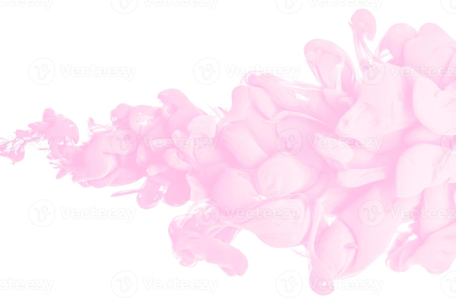 acrylic ink in water form an abstract smoke pattern isolated on white background photo