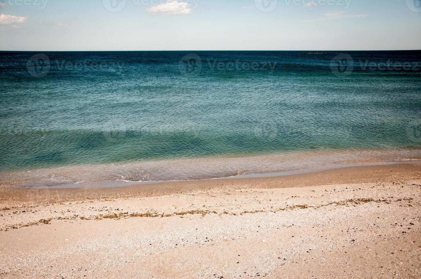 complete beach view of the shore photo