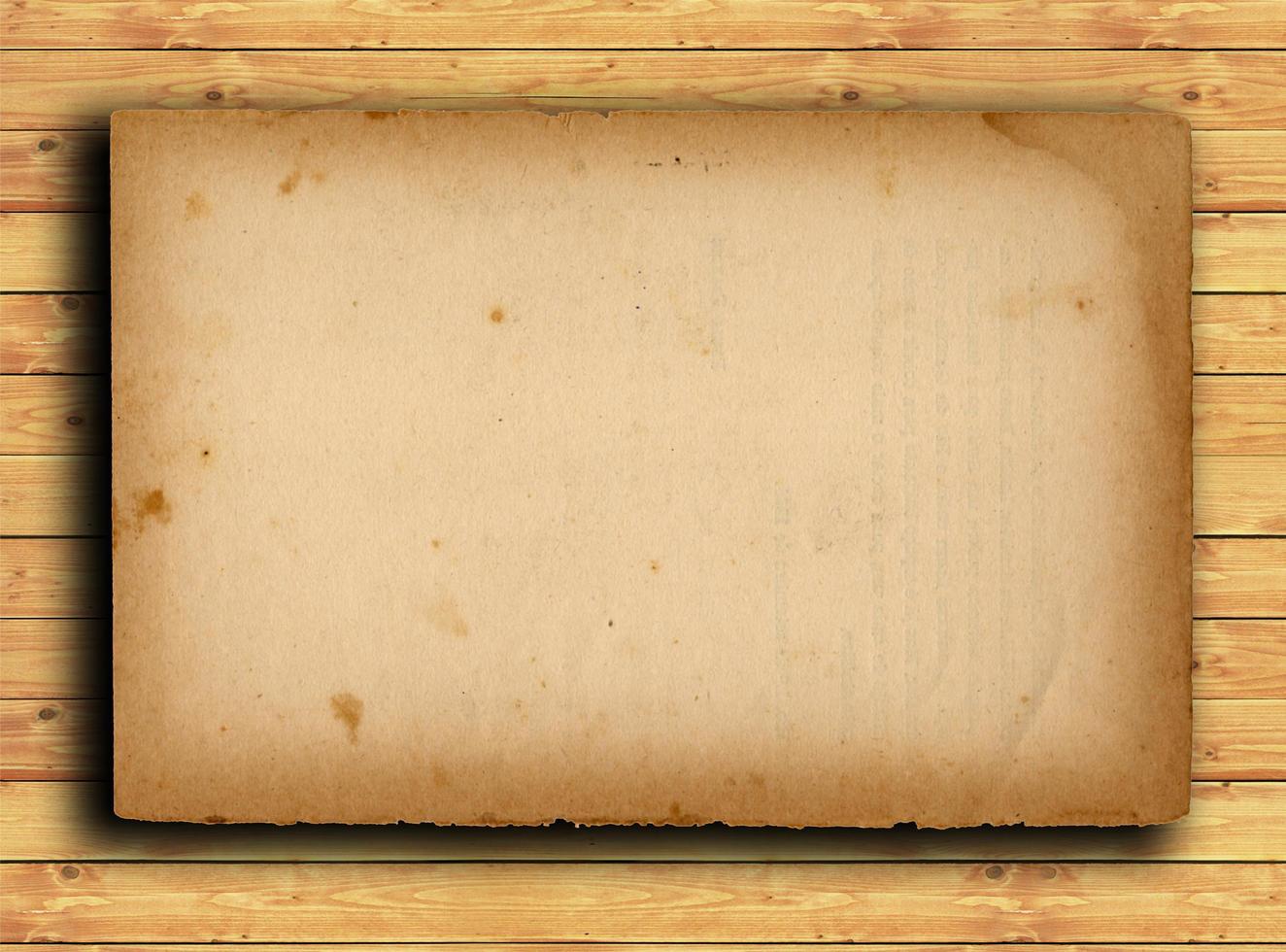 old paper on brown wood texture with natural patterns photo