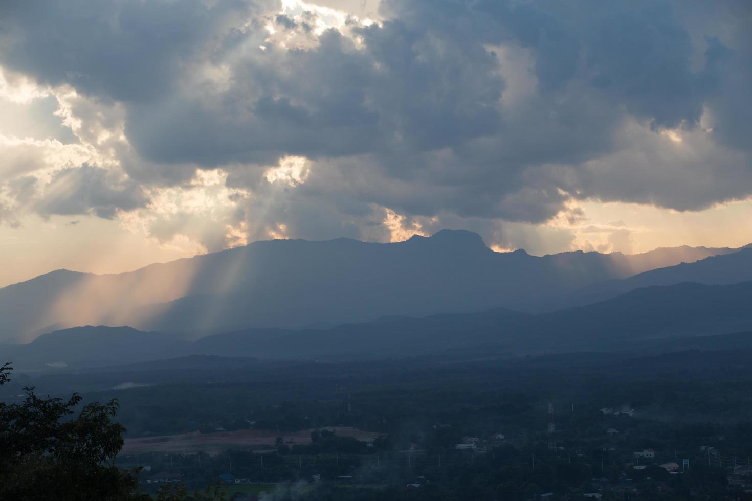 sunrise with clouds, light and rays photo