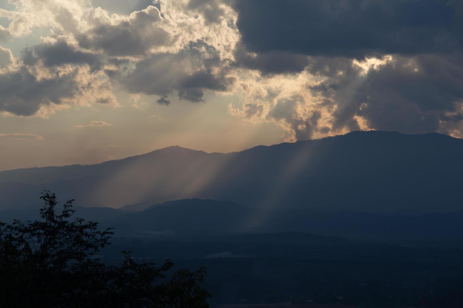 sunrise with clouds, light and rays photo