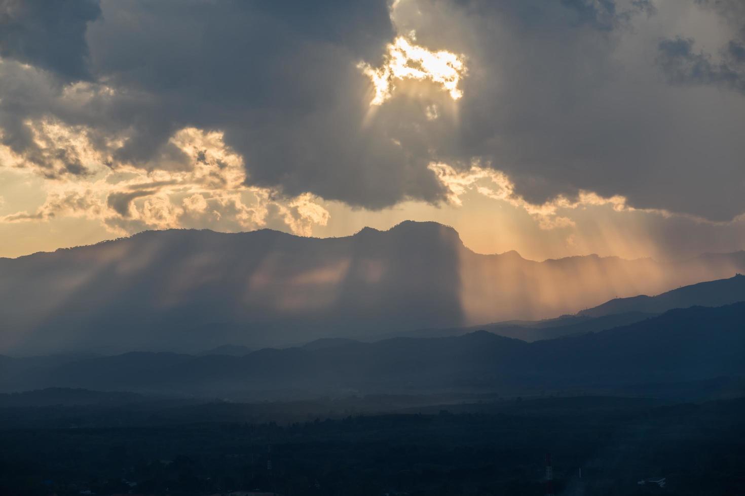 sunrise with clouds, light and rays photo