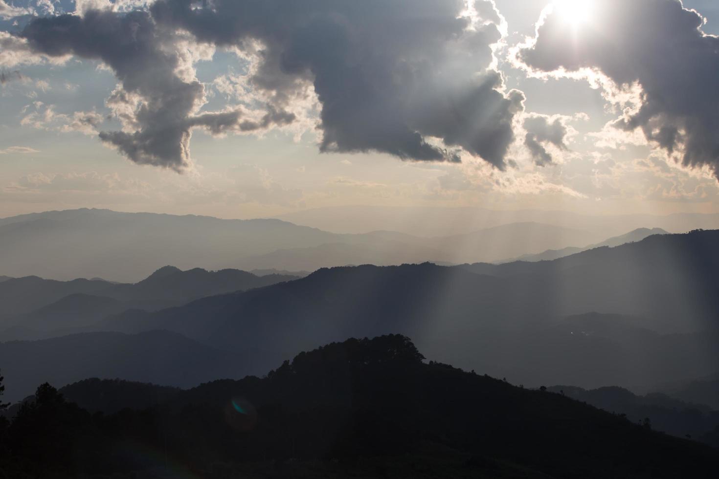 sunrise with clouds, light and rays photo