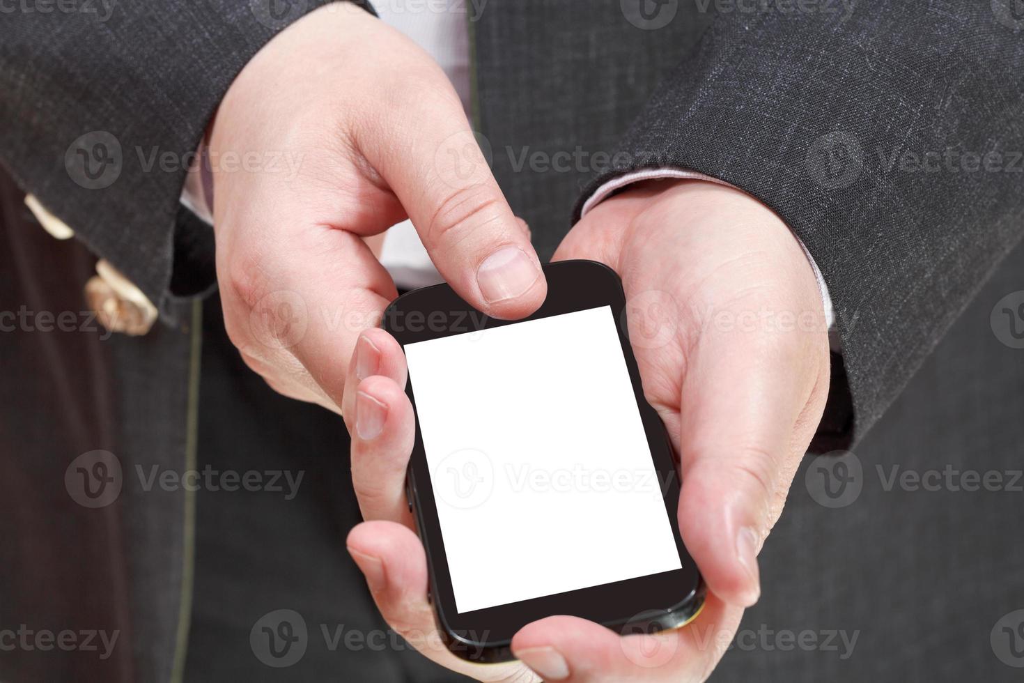 phone with cut out screen in businessman hand photo