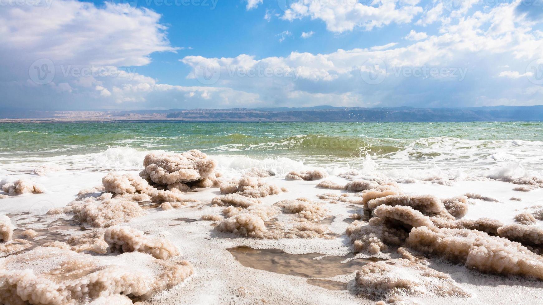crystalline salt on surface of Dead Sea coastline photo