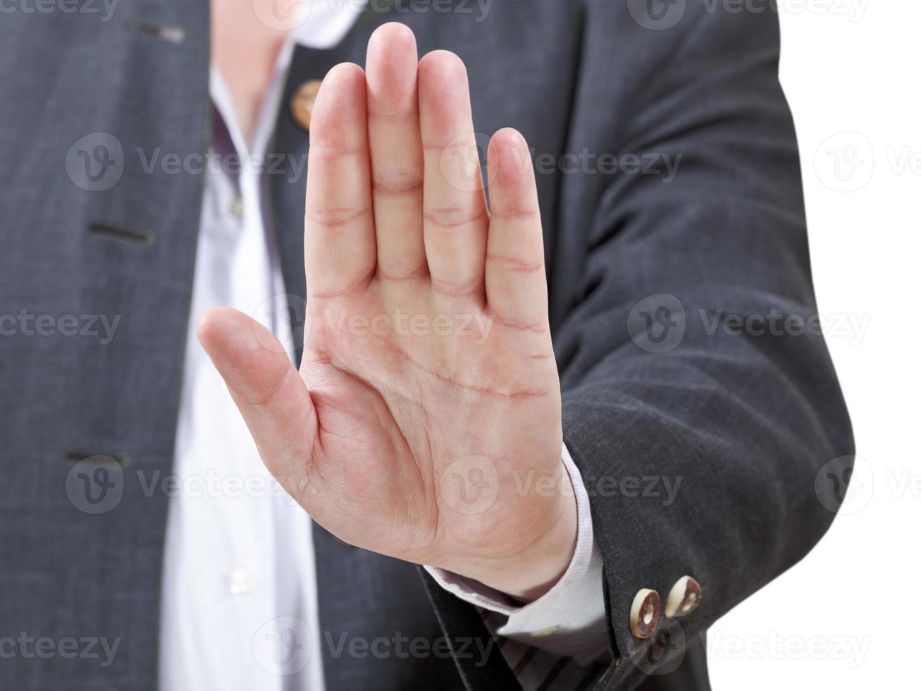 stop sign by open palm - businessman hand gesture photo