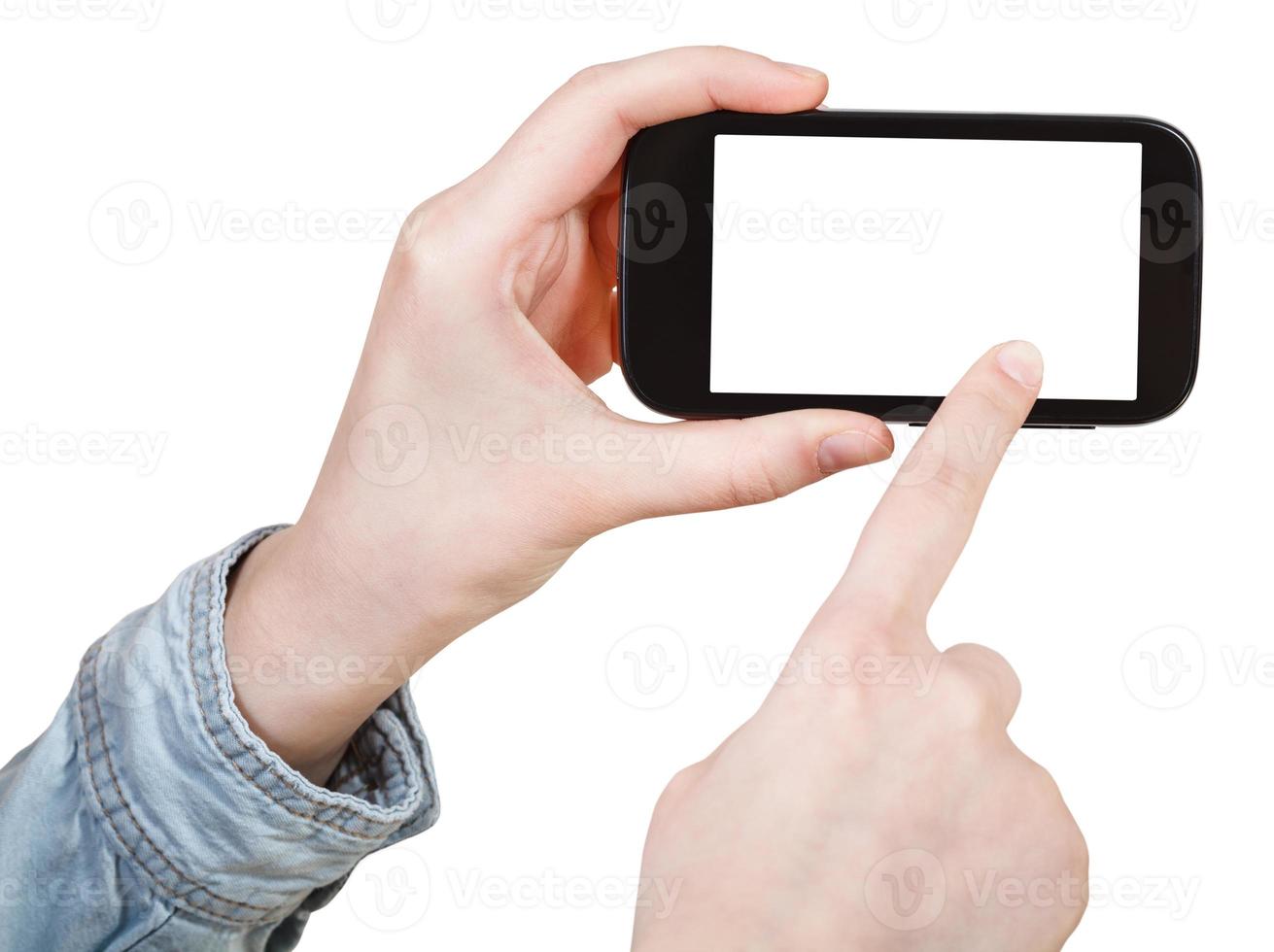 hand in shirt touching smartphone isolated photo