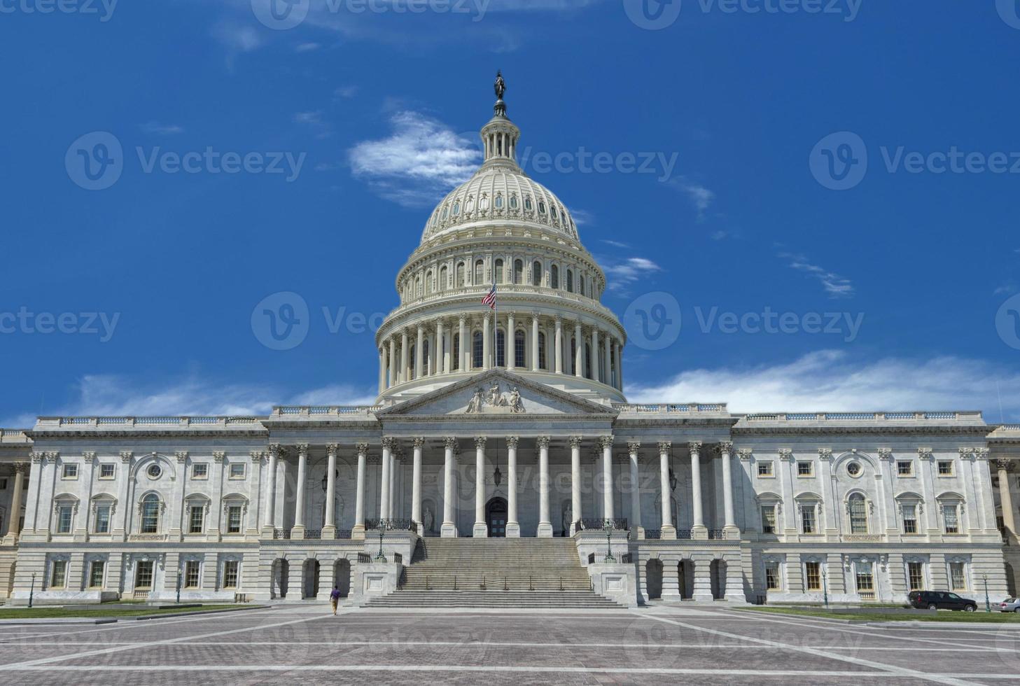 Washington Capitol on sunny cloudy sky background photo