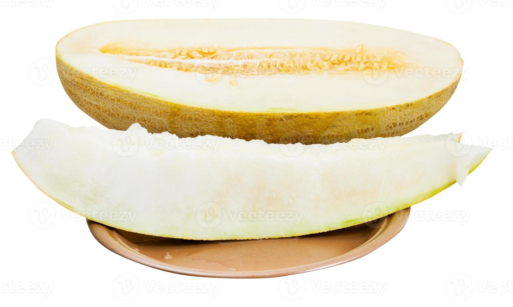 two slices and half of Uzbek-Russian Melon on plate photo