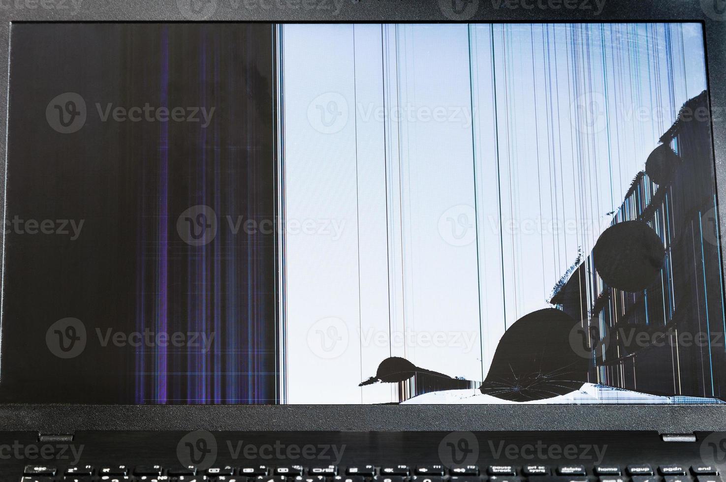 cracked LCD screen of laptop photo