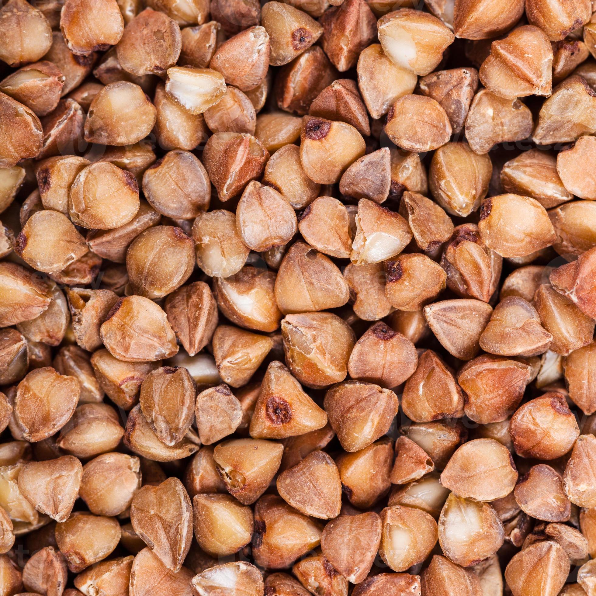 raw buckwheat seeds close up 12243623 Stock Photo at Vecteezy