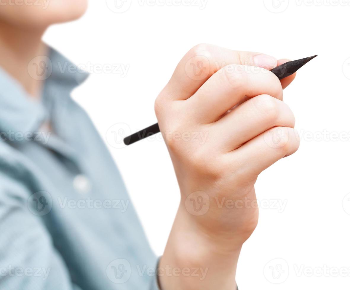chica dibuja con lápiz aislado en blanco foto