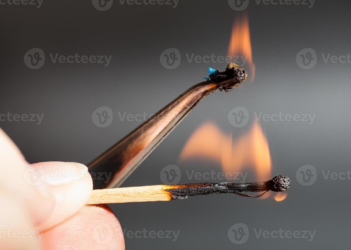 match flame ignites polyamide tissue sample photo