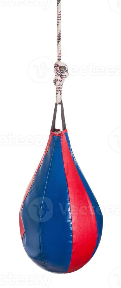 boxing punch bag with dint of blow isolated photo